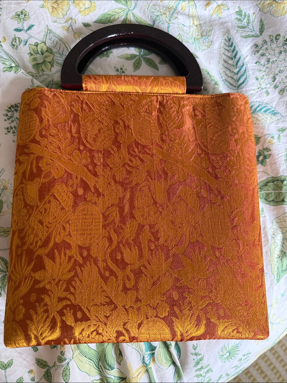 Elegant Orange Brocade Tote with Dark Wood Handles